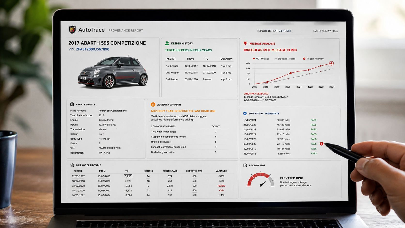 A laptop screen displaying an AutoTrace provenance report for a used Abarth 595 vehicle.